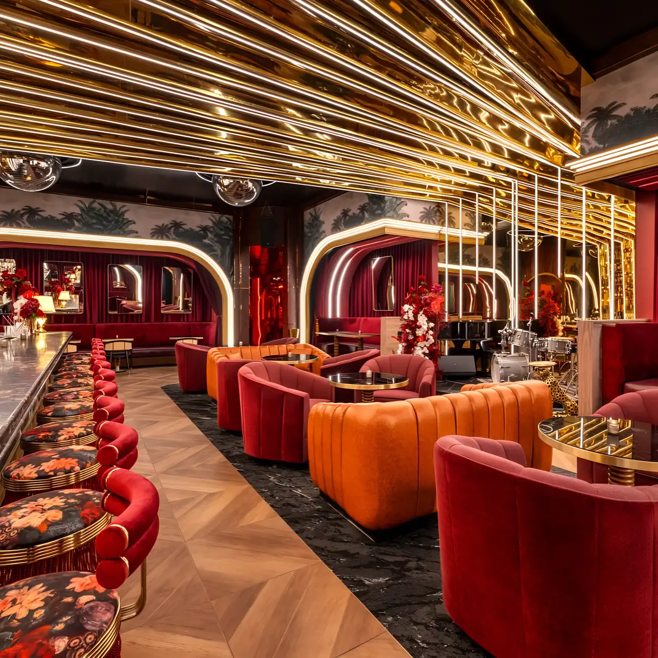 The lounge at Tell Your Friends under the gold ceiling
