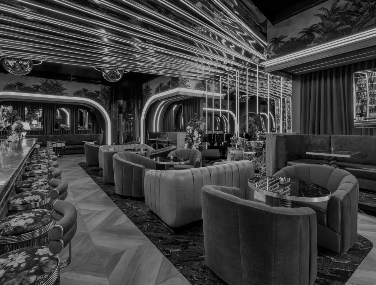 The lounge at Tell Your Friends in black and white