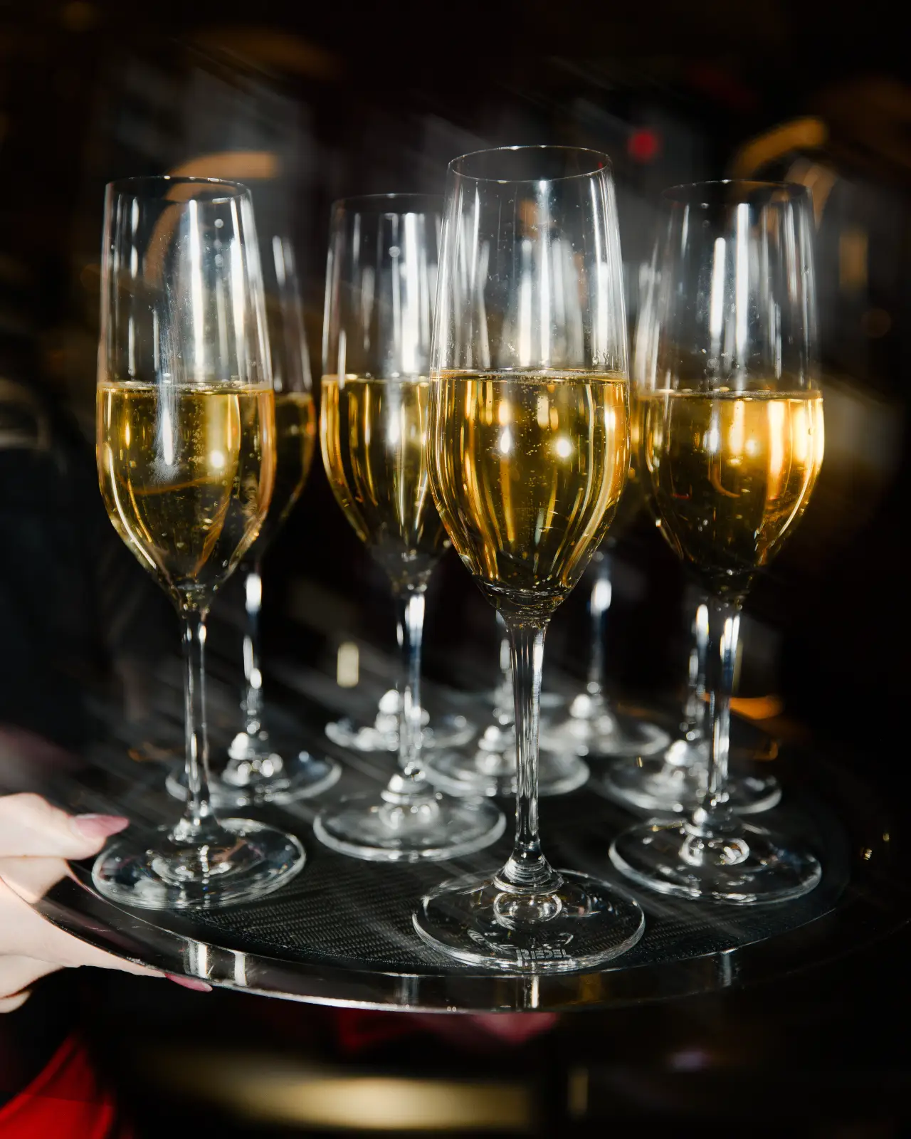 Glasses of champagne on a tray