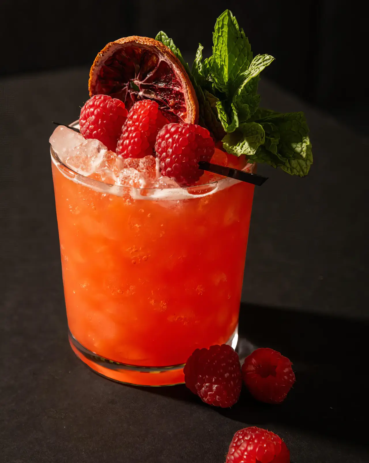 A raspberry cocktail with mint