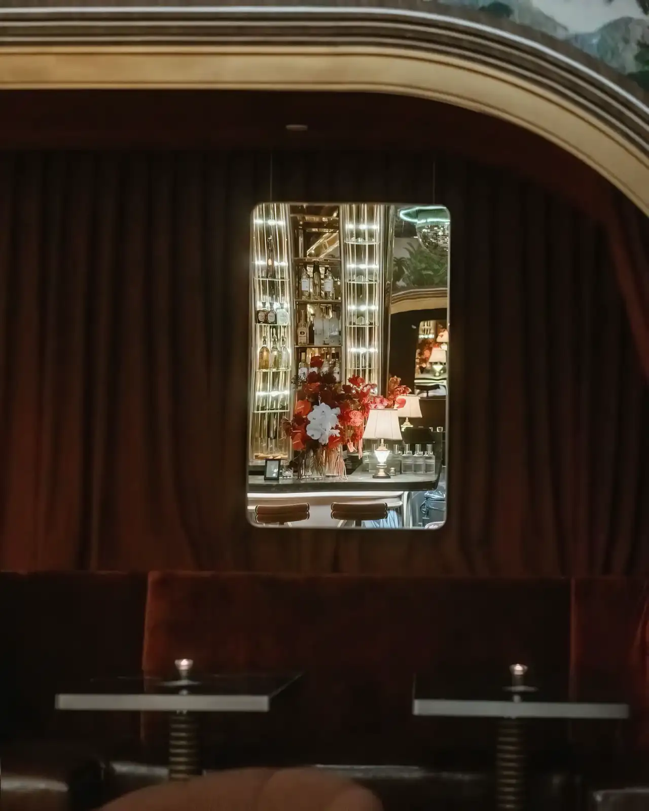 A private booth behind the velvet curtain