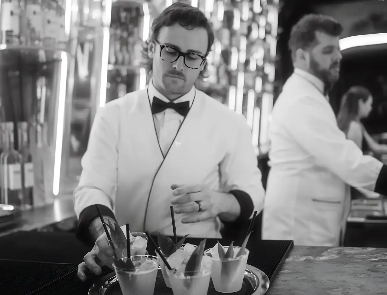 Bartenders at work at Tell Your Friends
